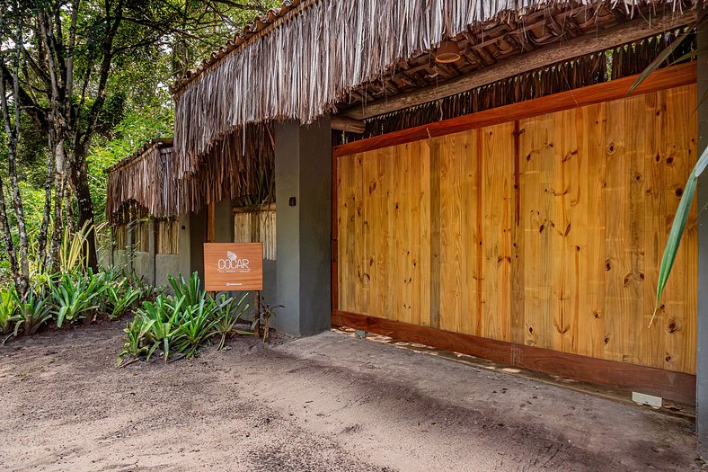 Casa Caqui Trancoso - Cravejada em reserva natural